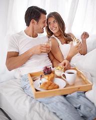 Image showing Love, couple and breakfast in bed, quality time and enjoy Valentines day surprise, gift and loving together. Romance, man and woman in bedroom, joyful or bonding for weekend break, relax and marriage