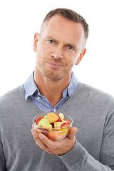 Image showing Man with salad choice isolated on a white background for healthy diet, green lunch or nutritionist decision. Professional person or model thinking of vegan lifestyle fruits, food and face in studio