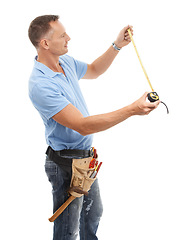 Image showing Construction worker, measuring tape and man for maintenance, engineering and building. Manual labor, repair service and contractor, builder and handyman with measure tools or gear on white background