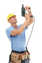 Image showing Construction, drill and man with tools for building, maintenance and civil engineering. Manual labor, technician and isolated contractor, builder and handyman with gear belt on white background