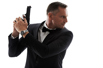 Image showing Spy, gun and secret agent model with isolated, white background and mockup ready for action. Actor, weapon and tuxedo suit of a man looking mysterious with classy style and pistol for danger