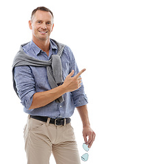 Image showing Man, portrait and pointing for product placement standing isolated against a white studio background. Happy male with smile showing gesture or pointed finger in presenting for advertisement on mockup