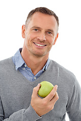 Image showing Man, happy studio portrait and apple fruit for health, diet and wellness isolated on a white background. Model person with nutrition vegan food for a healthy lifestyle, motivation and clean eating