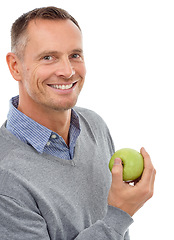 Image showing Man, happy portrait and apple fruit for health, diet and wellness isolated on a white background. Model person with nutrition vegan food for a healthy lifestyle, motivation and clean eating in studio