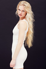 Image showing Beauty, fashion and portrait of woman in white dress with makeup on face, cosmetics and isolated on black background. Sensual, desire and beautiful model in studio with mockup and space and long hair