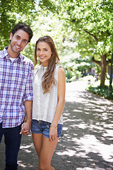 Image showing Bonding couple, portrait or holding hands in park, nature or garden walk on valentines day date, romance love or summer break. Smile, happy man or woman in relax trust, partnership or safety support