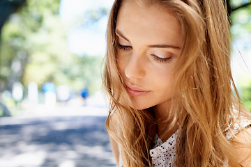 Image showing Woman, face and outdoor in park with travel and nature, peace and content with mockup space and beauty. Dream, thinking and zen with mindfulness, young female in Boston with closeup and adventure