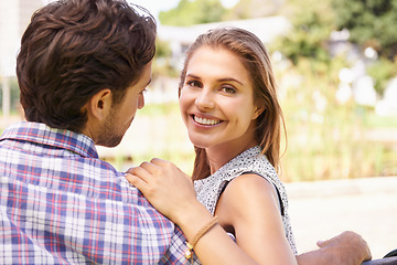 Image showing Couple, portrait and bonding on love bench in nature park or city garden on valentines day, romance date or marriage anniversary. Smile, happy woman or man on outdoor seat hug or relax wood furniture