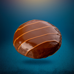 Image showing Flying doughnut with chocolate glaze