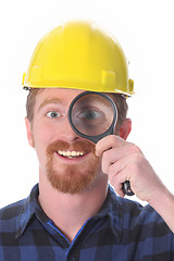 Image showing construction worker with loupe