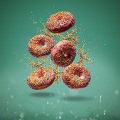 Image showing Flying sweet donuts