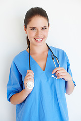 Image showing Studio portrait, stethoscope and nurse happy for nursing career, medical healthcare or cardiology health. Medicine doctor, caregiver woman or hospital surgeon with smile isolated on white background