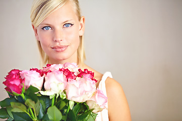 Image showing Portrait, mockup and woman with bouquet roses, smile and gift for Valentines day, happiness and studio background. Face, female or lady with flowers, love and joyful with peace or romance on backdrop