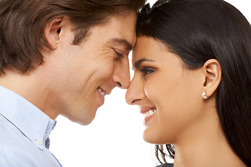 Image showing Couple, forehead and smile for love, valentines day or date in affection isolated against white studio background. Closeup of man and woman smiling touching heads embracing special month of romance