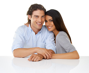 Image showing Happy couple, portrait and love with a hug, care and smile together isolated on a white background. Young man and woman happy about valentines day date, support and commitment with partner at table