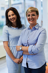 Image showing Portrait of a two teacher in a preschool institution, in the background of the classrooms