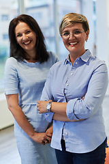 Image showing Portrait of a two teacher in a preschool institution, in the background of the classrooms