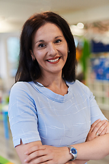 Image showing Portrait of a teacher in a preschool institution, in the background of the classrooms