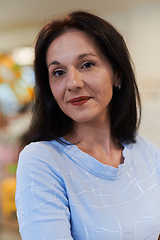 Image showing Portrait of a teacher in a preschool institution, in the background of the classrooms