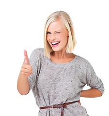 Image showing Happy woman, portrait smile and thumbs up for good job, deal or well done isolated against a white studio background. Blond female standing and showing thumbsup hand gesture with wink for agreement