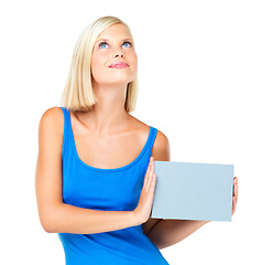 Image showing Paper, mockup and woman holding poster advertising, marketing and billboard for sale, deal or giveaway. Portrait, thinking and female showing brand on a board isolated in a studio white background