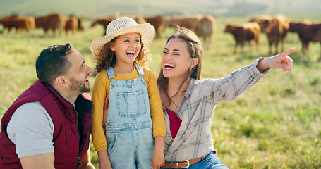 Image showing Happy family bonding on a cattle farm, happy, laughing and learning about animals in nature. Parents, girl and agriculture with family relaxing, enjoying and exploring the outdoors on an open field