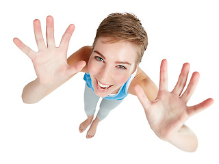 Image showing Top view, hands and portrait of woman with smile on white background for announcement, surprise and deal. Copy space, mockup and face of girl isolated in studio showing palms, hand gesture and sign