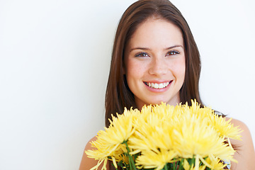 Image showing Flower bouquet, portrait and happy studio woman with floral product, sustainable gift or yellow spring present. Mockup face, advertising space and eco friendly model girl isolated on white background