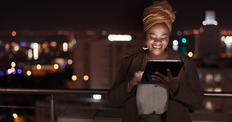 Image showing Tablet, night and balcony with a business black woman doing research online while standing outdoor at her office. Working late, search and deadlines with a female employee doing overtime at work