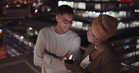 Image showing Night, man and black woman with smartphone, connection and social media outdoor. Latino male, Nigerian female and cellphone for communication, share ideas and discussion late evening or online search