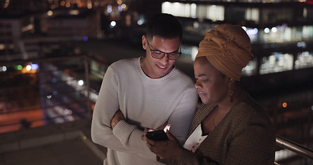 Image showing Night, man and black woman with smartphone, connection and social media outdoor. Latino male, Nigerian female and cellphone for communication, share ideas and discussion late evening or online search