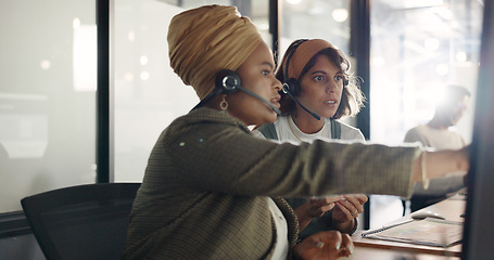 Image showing Call center, training and black woman coaching recruit at customer service agency in Africa. Diversity, teamwork and crm, telemarketing manager consulting woman at desk for customer support help line