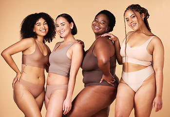 Image showing Diversity, happy woman and body portrait of group together for inclusion, skin beauty and power. Underwear model friends on beige background for positivity, pride and motivation support for self love