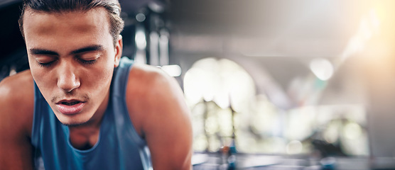 Image showing Tired, man and gym for fitness, workout and intense training against bokeh background space. Exercise, break and athletic male stop for breathing, rest and exhausted from cardio, sports or challenge