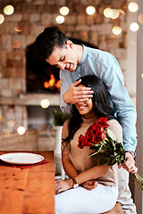 Image showing Surprise, love and man with flowers for his wife while on a romantic date for valentines day. Happy, smile and husband with a bouquet of red roses for his woman while at dinner for their anniversary.