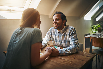 Image showing Valentines, couple love and holding hands at restaurant on table, talking and laughing at joke. Comic, romance diversity and affection of man and woman on date, having fun and enjoying time at cafe