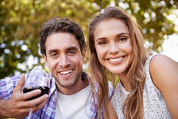 Image showing Love couple, portrait or wine on picnic, valentines day or romance date bonding in nature park or garden low angle. Smile, happy woman or man and alcohol drinks glass in marriage anniversary security