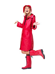 Image showing Winter, red raincoat and woman on a white background with smile, content and happy mindset. Creative aesthetic, weather and isolated full body of girl with boots for style, trendy clothes and fashion