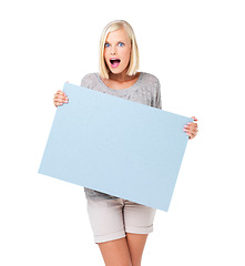 Image showing Wow, portrait and woman with poster for mockup, marketing or advertising space in studio isolated on a white background. Product placement, surprise and female with banner for mock up or promotion.