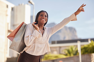 Image showing Taxi, hand and sign by black woman shopping in a city, happy and smile on mockup background. Girl, hands and gesture for transportation service after retail or mall visit in town on the weekend