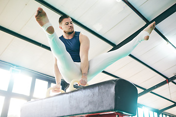 Image showing Fitness, gymnastics and man on a balance beam for training, cardio and strength at gym. Athletic, male and acrobat practice speed, control and sport routine for muscle, power or endurance performance