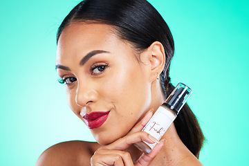 Image showing Beauty, cosmetic and portrait of a woman in studio with facial serum for skincare treatment. Cosmetics, face and female model from Mexico with natural makeup routine isolated by turquoise background.