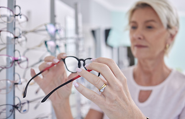 Image showing Senior woman, glasses and shopping for lens or frame for eye care, vision and wellness with optometry. Customer person making choice or decision for retail sale with health insurance at optics store