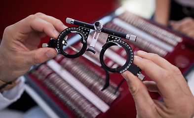 Image showing Optometry, eyewear and lens for a optical test with a optometrist in a ophthalmology clinic or store. Optic, glasses and trial prescription spectacles for eye care, health and vision at a shop.