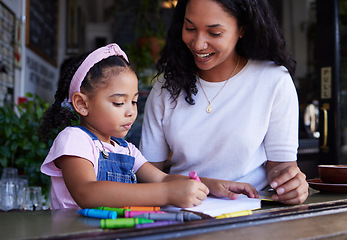 Image showing Bonding, drawing and mother and child at a restaurant with art, creativity and color on paper. Creative, happy and girl learning to draw with her mom while eating at a cafe and waiting for food