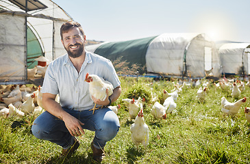 Image showing Man on farm, chicken and agriculture with smile in portrait, poultry livestock with sustainability and organic with free range. Happiness, farming and environment, animal and farmer is outdoor