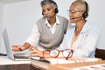 Image showing Call center, customer support and manager training a consultant by doing a consultation together online. Crm, sales and professional senior leader helping a female agent on a laptop in the office.