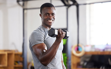 Image showing Strong, weight and portrait of a black man lifting for muscle, training and power in the gym. Smile, fitness and African athlete doing a workout, exercise or sports for body building and cardio