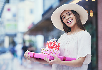 Image showing Gifts, boxes and portrait of a woman in a shopping mall buying products for a party, event or celebration. Happy, smile and female purchasing presents for valentines day, anniversary or romance.