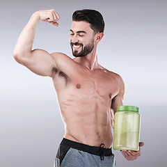 Image showing Protein shake, fitness and muscle with portrait of man for workout, health and bodybuilder. Diet, gym and training with athlete and powder for sports, exercise and nutrition in gray studio background